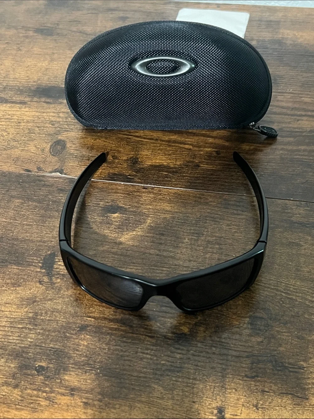 Oakley Black Sunglasses with Dark Lenses